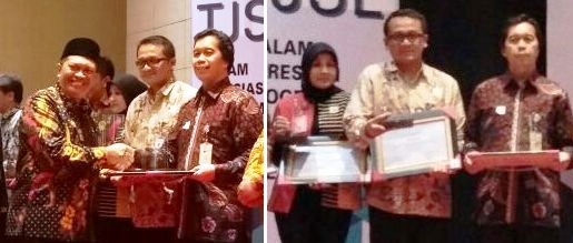  Kepala BI Jabar Wiwiek Sisto Widayat menerima penghargaan dari Wakil Walikota Bandung H. Oded M. Danial pada Malam Apresiasi Program TJSL, di Hotel Grandia Bandung, Jumat (8/12/17).